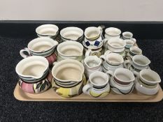 A tray of twenty Nixon & Bolam St Anthony pottery jugs - various sizes