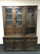 A Chapmans Siesta oak linen fold twin section cocktail display unit