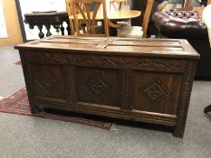 A Georgian panelled oak coffer,