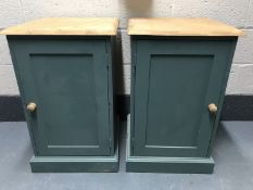 A pair of painted pine single door cupboards,