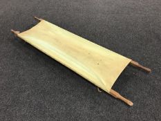A vintage folding stretcher