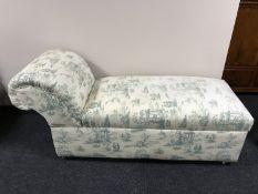An early 20th century storage chaise longue, on ceramic castors, width 155 cm.