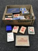A box of playing cards, bridge sets,