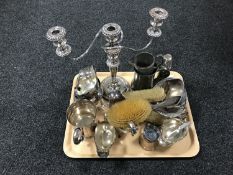 A tray of silver plated candelabrum, silver backed brushes, antique pewter tankard, metal items etc.
