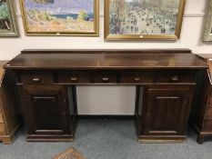 An early 20th century pine clerk's desk,
