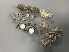 A collection of silver lattice jewellery