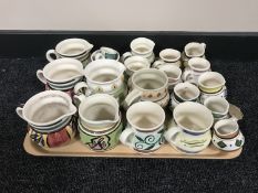 A tray of twenty Nixon & Bolam St Anthony pottery jugs - various sizes