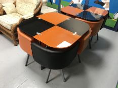 Two contemporary retro style glass top tables each with a set of stowaway chairs.