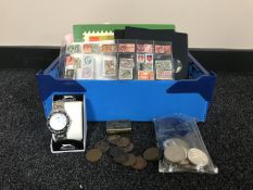 A box of assorted stamps, coins, Slazenger wrist watch,