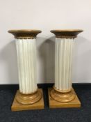 A pair of circular pine topped jardiniere stands CONDITION REPORT: Generally in