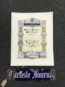 An enamel advertising sign, originally from the office of the Carlisle Journal,