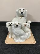 A tray of six assorted Staffordshire dogs,