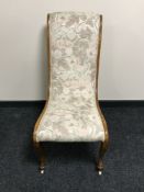 A 19th century mahogany bedroom chair, upholstered with two tone peach fabric,