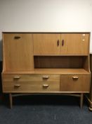 A teak G Plan cocktail sideboard