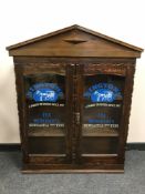 A Victorian and later bookcase ' Ringtons Tea',