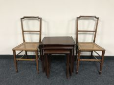 A pair of mahogany bedroom chairs and a nest of Parker Knoll tables