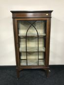 A Victorian inlaid mahogany display cabinet