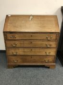 A 19th century oak bureau,