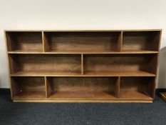 A set of mid 20th century teak open shelves