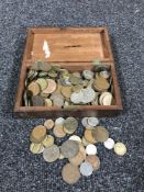 A cigar box containing early 20th century British and Foreign coins including George V pennies,