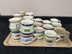 A tray of twenty one Nixon & Bolam St Anthony pottery mugs
