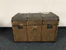 An early 20th century wooden bound trunk