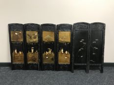An oriental ebonised two fold lacquered screen and four Japanese Shibayama lacquered panels