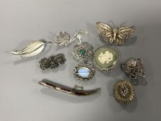 Ten silver brooches (10)