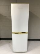 A Baumatic silver upright fridge freezer