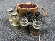 Three pairs of field glasses one in leather case