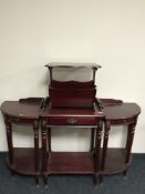 A mahogany two tier telephone table,