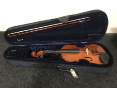 A 3/4 size Catherah violin in case with bow