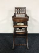 An antique mahogany adjustable child's commode high chair