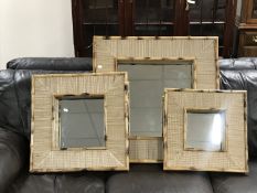 Three square graduated bamboo framed mirrors