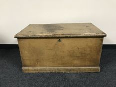 An antique pine blanket chest