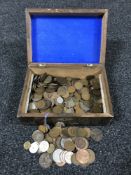 A cigar box containing early 20th century British and Foreign coins including George V pennies,