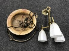 A copper and alabaster hanging light shade,