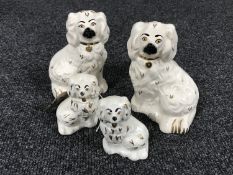 A pair of Royal Doulton Staffordshire-style spaniel dog figures,