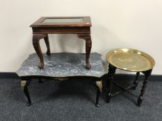 A mahogany Eastern style side table with brass inlay,