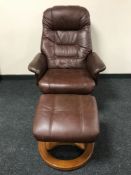 A brown leather Stressless adjustable armchair and footstool