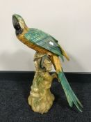 A mid 20th century chalk figure of a parrot