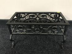 A wrought iron trivet