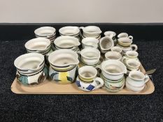 A tray of twenty Nixon & Bolam St Anthony pottery jugs - various sizes