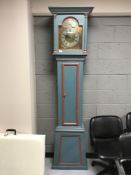 A continental painted long cased clock with brass and silvered dial, the dial dated 1780,