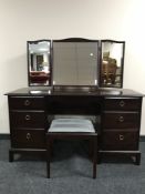 A Stag Minstrel dressing table with triple mirror and stool
