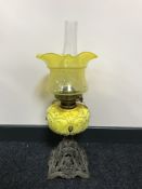 An early 20th century Duplex oil lamp with a yellow glass shade CONDITION REPORT: