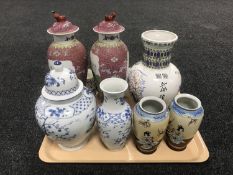 A tray of 20th century oriental vases,