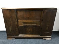 A continental walnut sideboard