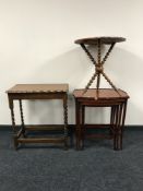 A circular table on a tripod leg,