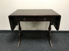 A mahogany sofa table fitted two drawers